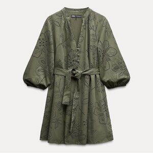 Zara Mini long sleeve dress with rubberish embroidery and belt.
